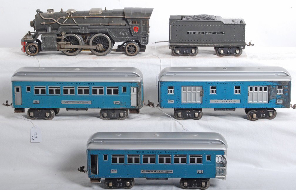 Lionel No. 385E loco, 385W, 309, 310, 312 pass. c: Prewar Lionel standard gauge No. 385E steam locomotive and 385W tender missing with 309 Pullman coach, 310 RPO baggage car, 312 observation. Loco has some very light casting fatigue to steam chests an