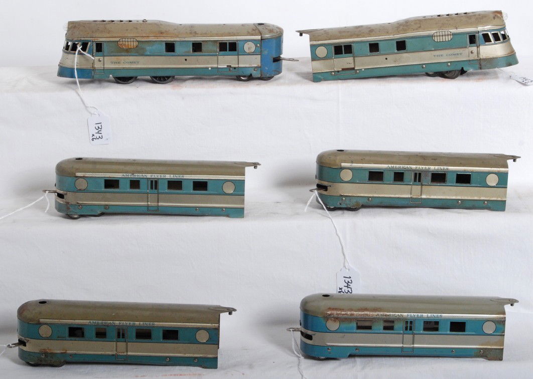 American Flyer 6 unit The Comet streamline articu: Prewar American Flyer O gauge tinplate electrical streamlined articulated diesel passenger train, The Comet. Train is composed of powered unit, four coaches, and a dummy/observation unit. Trains look