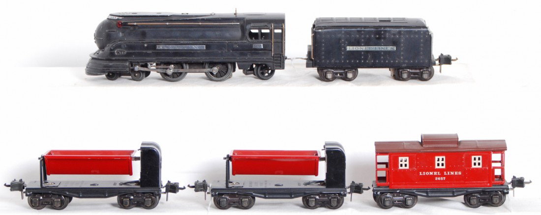 Lionel No. 238 PRR, 2225W, 3659, 3659, 2657 freig: Prewar Lionel O gauge No. 238 Pennsylvania streamlined steam locomotive with 2225W whistle tender, two 3659 automatic dump cars (both are restored), and a 2657 caboose. Trains look very nice, clean an