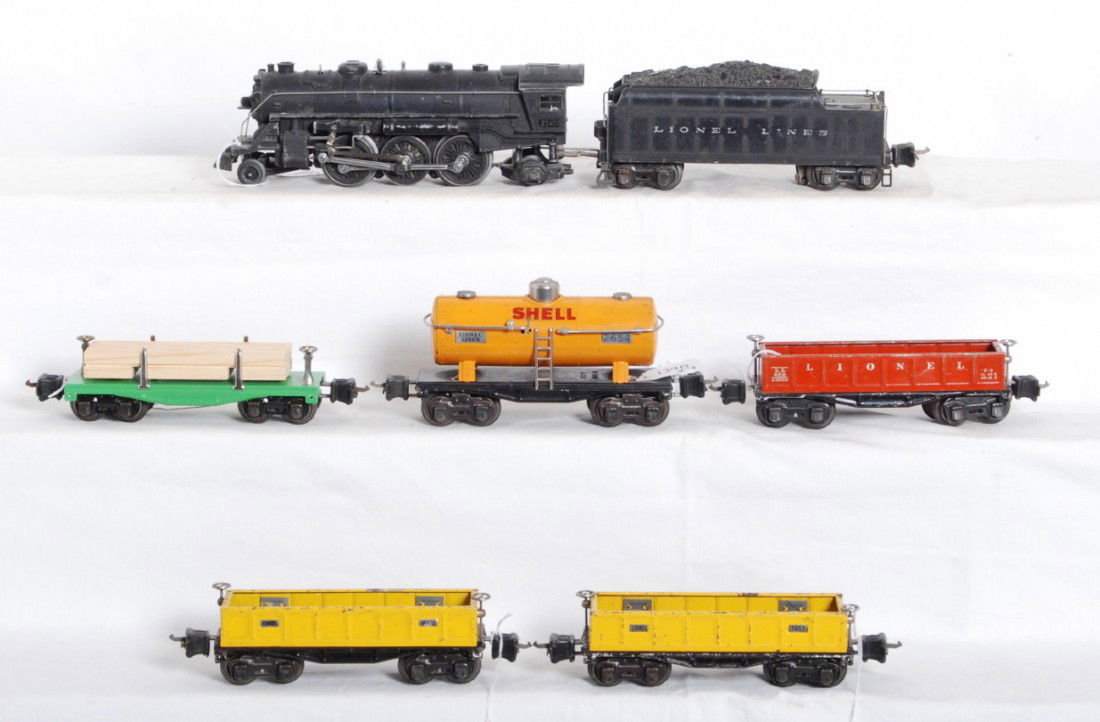 Lionel 224E, 2224W, lumber, 652, 652, 2652, 2654: Prewar Lionel O gauge No. 224E loco, 2224W whistle tender, unnumbered flatcar (repainted), two 652 gondolas, 2652 gondola, and 2654 Shell tank. Trains look C5-6.