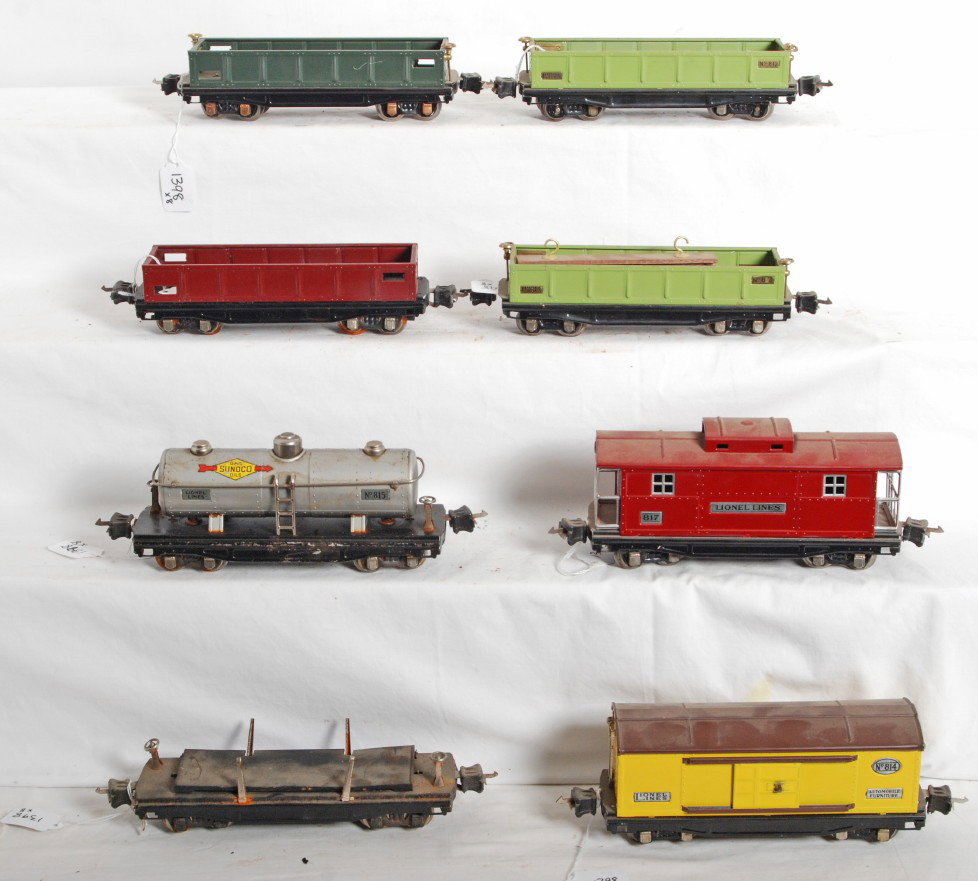 Nice lot of Lionel prewar 800 series freight cars: Prewar Lionel, restored/partially restored lot of Lionel prewar freight cars, 3811 flatcar, four 812 gondolas, 814 boxcar, and 817 caboose. Please view the photographs for the best description and as 