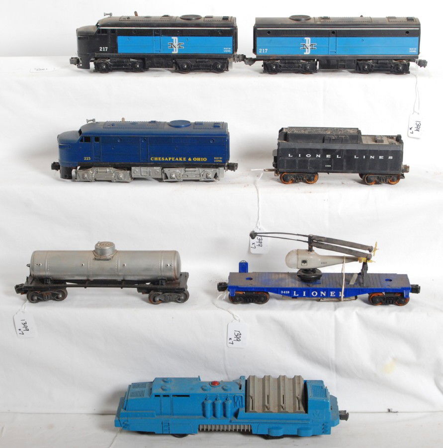 Lionel postwar 44, 217, 225, tank, 233W, 3419: Postwar Lionel O gauge 44 U.S. Army missile launcher, 217 Boston and Maine Alco diesel A and B unit, 225 Chesapeake and Ohio Alco diesel A unit, stripped tank car, 233W tender with whistle, and 3419 h