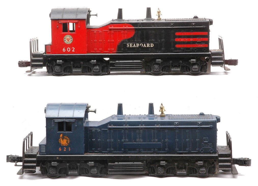 Lionel 602 Seaboard 621 Jersey Central Switchers: Lionel postwar 602 Seaboard NW2 switcher and a 621 Jersey Central NW2 switcher. The 602 is C6 and the 621 is C5.