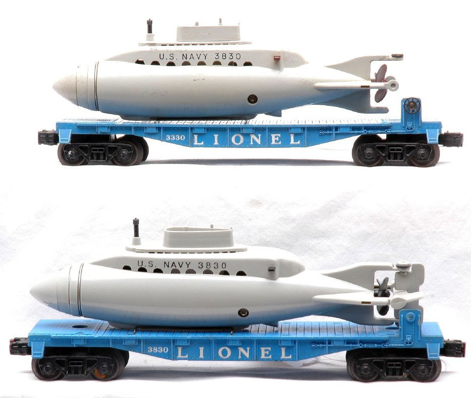 Lionel 3330 3830 Flats w/U.S. Navy Submarines: Lionel postwar 3330 flatcar with 3830 U.S. Navy submarine and a 3830 flatcar with U.S. Navy submarine. The 3330 is C6 and the 3830 is missing a brake wheel however rest of car is C7.