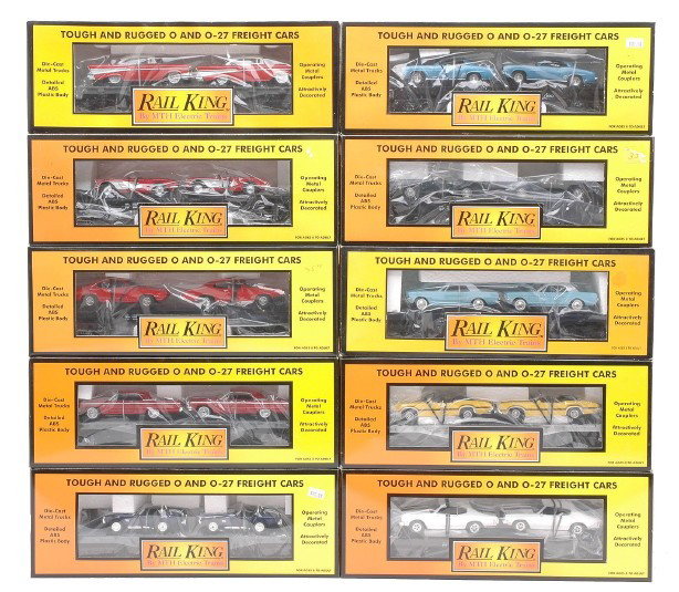 RK MTH Selection of Transports w/Ertl Loads OBs: Rail King by MTH auto transports with Ertl loads including; 30-7610 with Ô57 Chevys, 30-7617 with Ô64 Mustangs, 30-7624 with Ô64 Corvettes, 30-7634 with Ô69 CamaroÕs, 30-7639 with Ô68 GTOÕs, 30