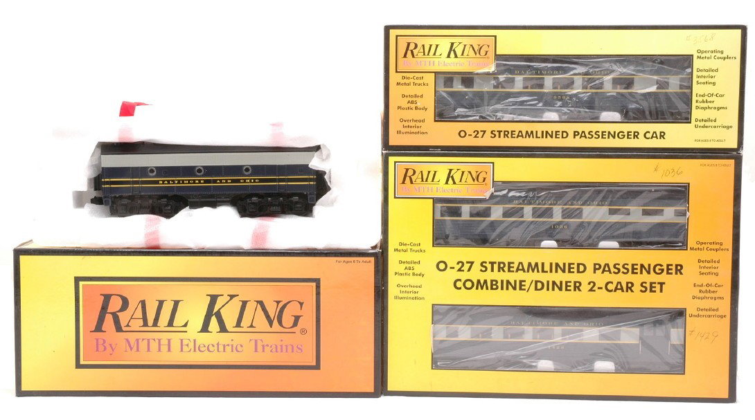 RK by MTH B&O 30-2143-3 30-6116 30-6127 OBs: Rail King by MTH 30-2143-3 Baltimore & Ohio F-3 B unit, 30-6116 Baltimore & Ohio Streamline coach car and a 30-6127 Baltimore & Ohio combine/diner set all in OBs. Diesel and cars are C9-10.