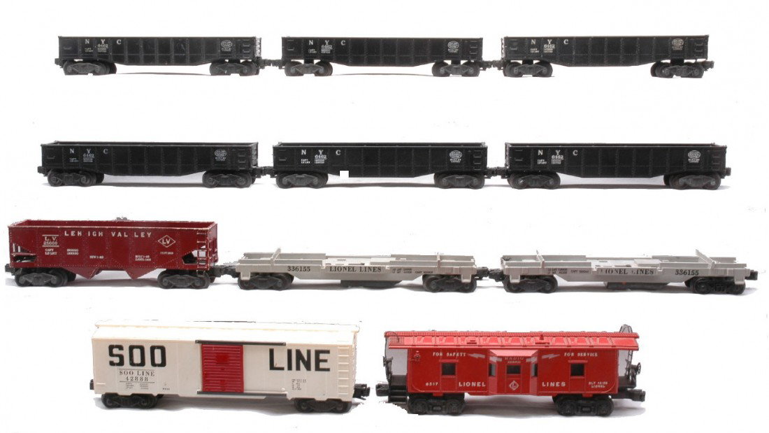 Lionel six 6462 two 3361 6456 6517 Soo Line: Lionel postwar freight cars including; six 6462 New York Central gondolas, two 3361 operating log dumps missing the log cradles, 6456 maroon Lehigh Valley hopper and a 6517 bay window caboose. Also in