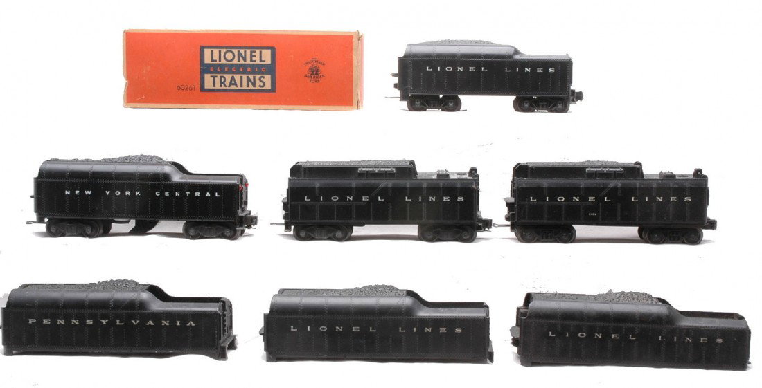 Lionel 6026T 243W 243W 2046W & Tender Shells: Lionel postwar tenders including; 6026T in OB, two 243W and a 2046W with reproduction NYC shell. One of the 243W has broken steps and is C6. Also included are three tender shells which all have damage