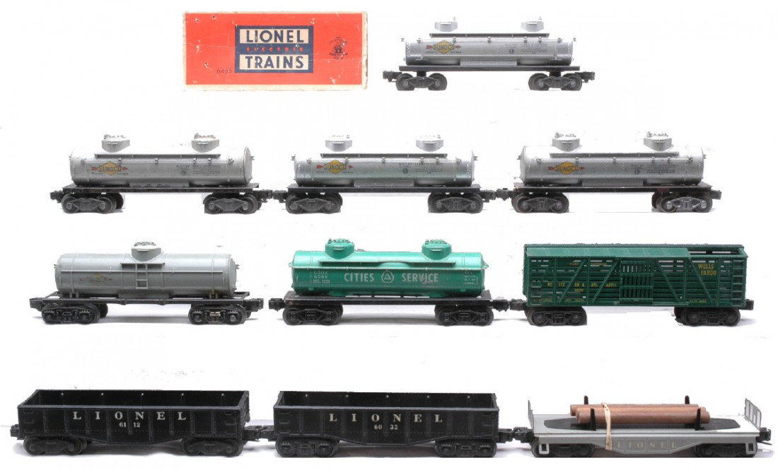Lionel 1005 3370 6032 6045 6112 2465 6465 6111: Lionel postwar freight cars including; 1005 Scout Sunoco tank, 3370 Wells Fargo operating stock car missing inner components, 6032 gondola, 6045 Cities Service two dome tank, 6112 gondola, 2465 silver