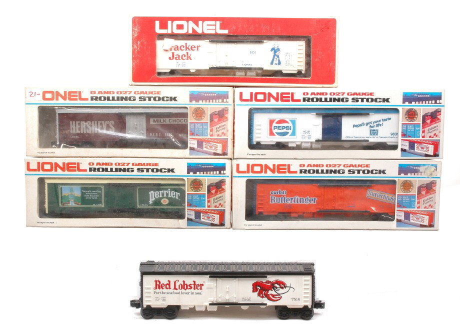 Lionel 9814 9831 9853 9858 9867 LN OBs 7510: Lionel billboard reefers including; 9814 Perrier, 9831 Pepsi, 9853 Cracker Jack, 9858 Butterfinger, 9867 Hershey all in OBs and a 7510 Red Lobster. All cars are C8-9.