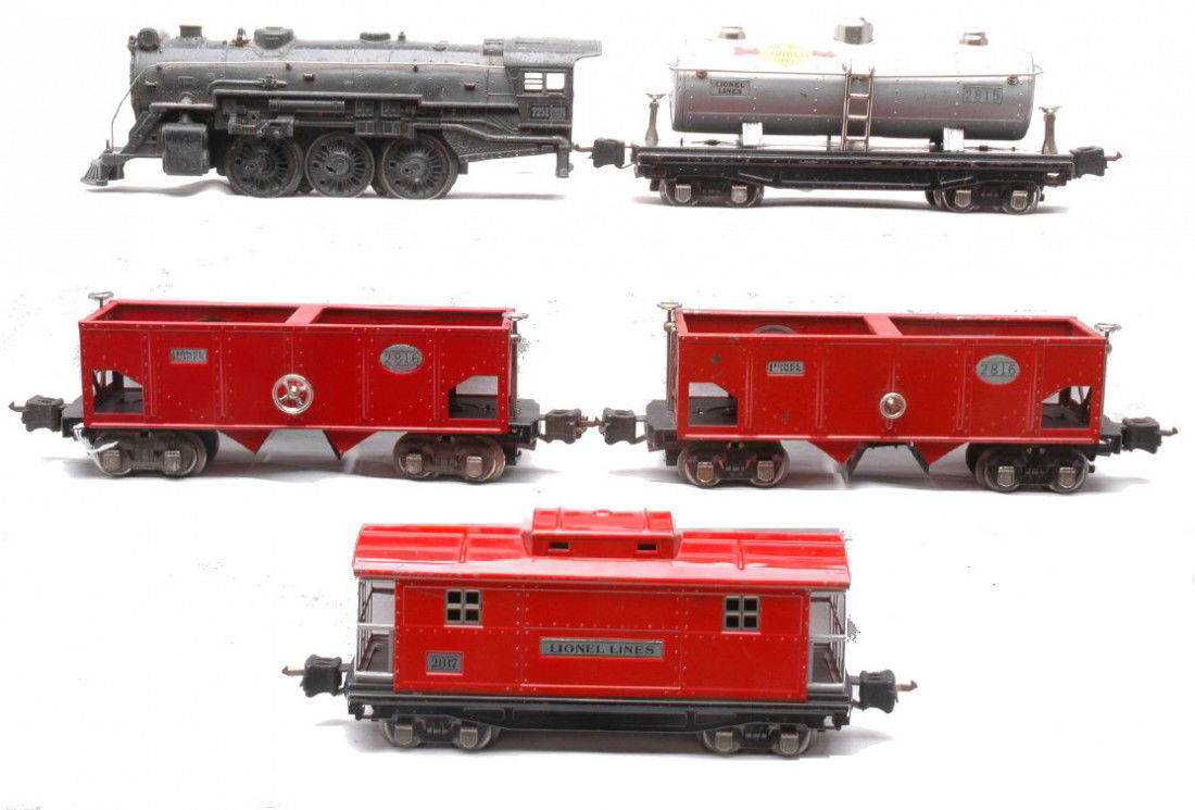Lionel Prewar 2815 2816 2816 2817 225E Loco: Lionel prewar O gauge 2815 silver Sunoco tank, two 2816 gondolas, one red and one maroon and a 2817 red caboose. The two hoppers and the caboose have been restored and the 2815 is C5. Also included is