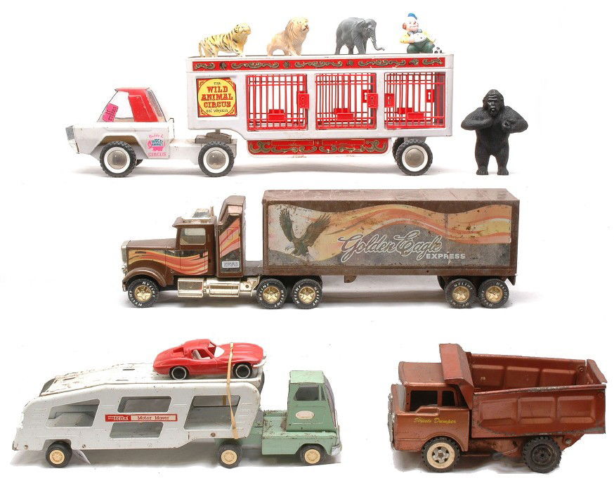 Buddy L Wild Animal Circus Truck Tonka Vehicles: Buddy L Wild Animal Circus truck with animals and a selection of Tonka trucks, road grader and trencher. Also included is a Structo Express and a Nylint semi. Please view photo to verify selection and
