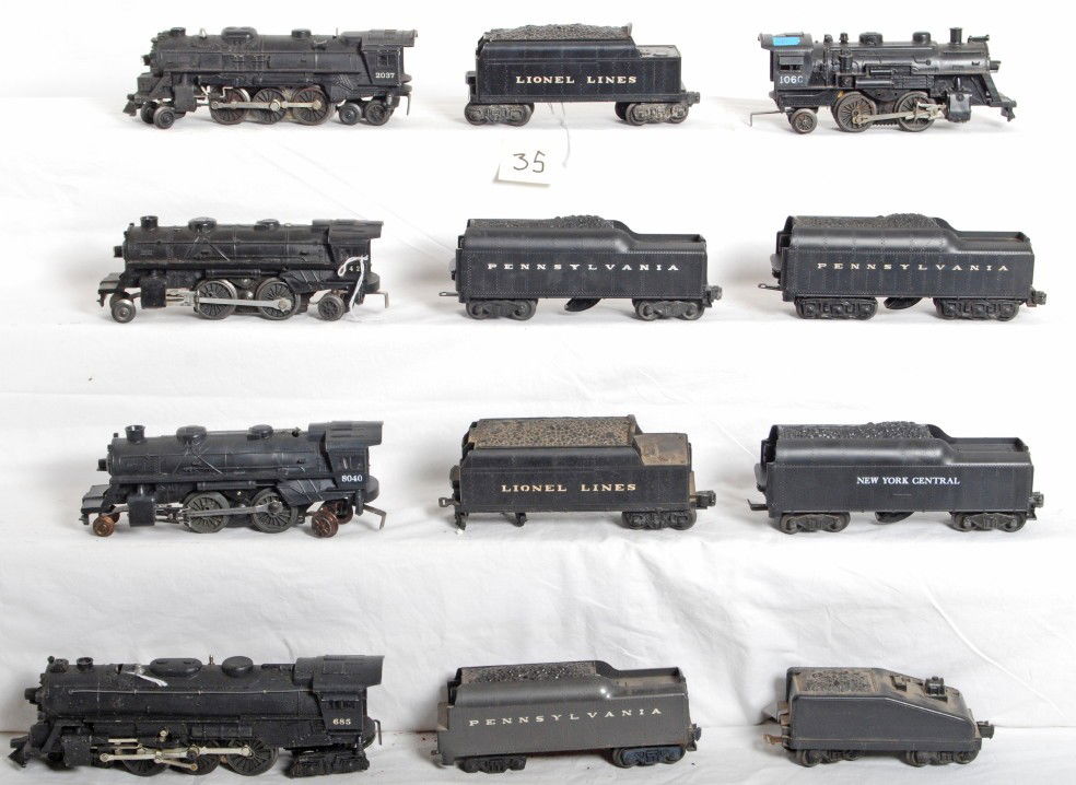 Five modern and postwar Lionel locos, seven tenders: Postwar and modern era Lionel O gauge steam locomotives and tenders. Trains look C5-7 with one 1666 T-4 Lionel Lines tender shell having broken screw mounts, sold as is with no returns. 1060, 8040, 24