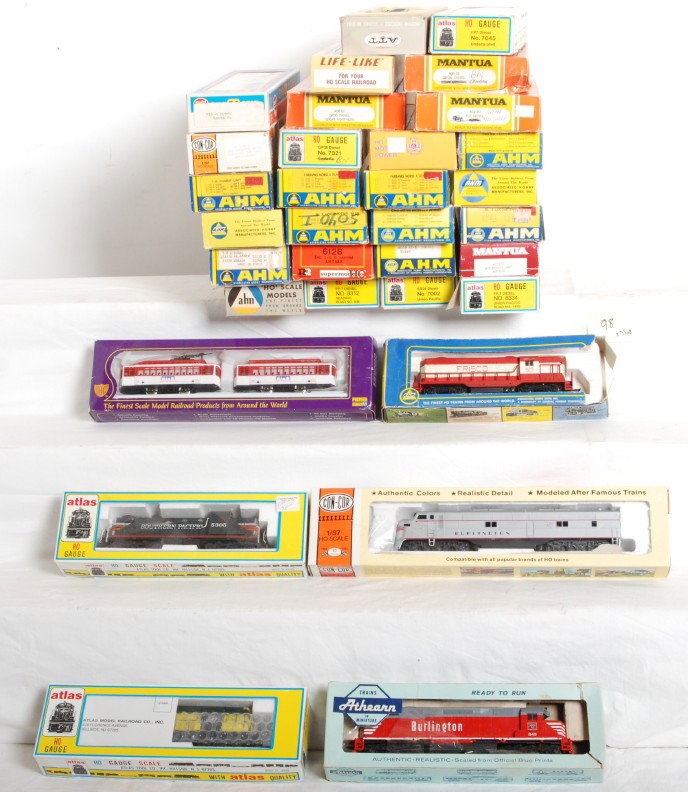 33 AHM, Mantua, and Atlas HO locomotives: Modern HO locomotives in OBs. Manufactures include AHM, Atlas, Mantua, Athearn and more. Thirty three locos with roads such as Union Pacific, Great Northern, Burlington etc. A good mix of powered and 