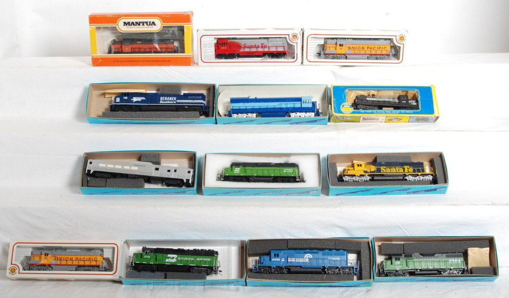 13 HO dummy and powered units Conrail, BN, Etc: Athearn and Bachmann modern HO locomotives. Thirteen locomotives include nine Athearn and one Mantua dummy locomotives with road names such as Conrail, Burlington Northern, Santa Fe etc. Four powered 