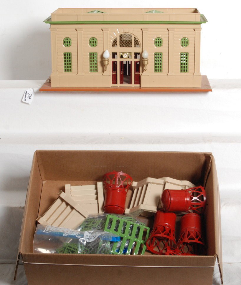 T reproductions 115 station and 840 power station : T Reproductions modern standard gauge including tan and cream 115 station. Base has some paint chip repairs and dust. C7. Also includes a box of 840 power station parts including water towers, windows