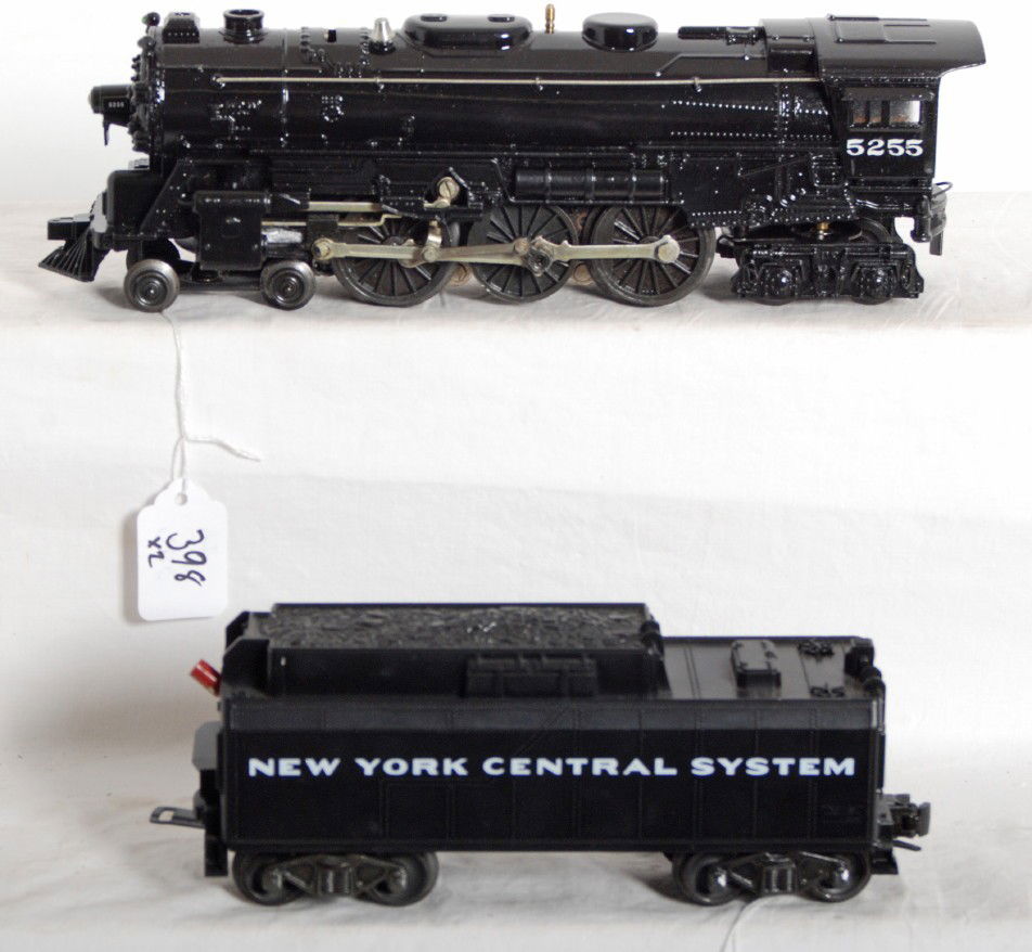 Lionel 2065 redecorated as New York Central 5265: Lionel Postwar O Gauge 2055 steam locomotive and tender. Both locomotive and tender have been repainted to represent New York Central 5255. Loco has also had tether added. Tender frame is 6026W with M