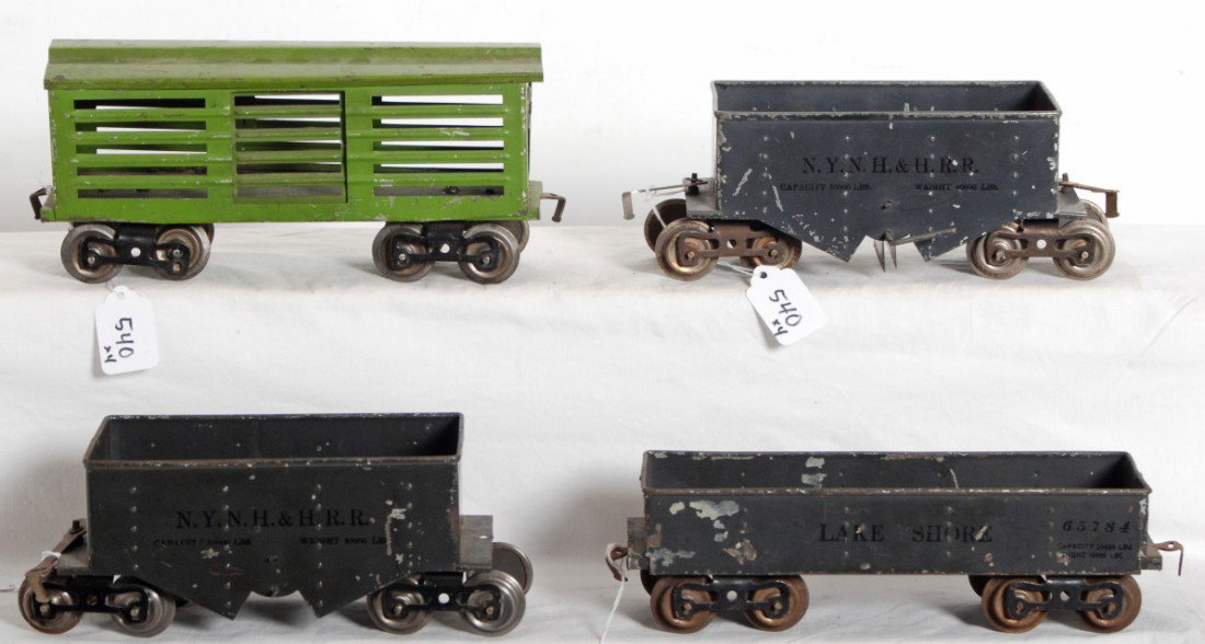 Lionel No. 112, 113, 116, 116 standard gauge: Prewar Lionel standard gauge freight cars, 112 gondola, 113 stock car, and tow 116 ore cars. One 116 is missing a coupler. Trains otherwise look C5-6.