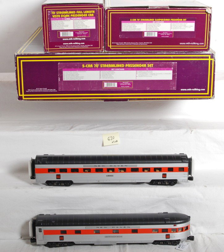MTH New Haven 8 car streamlined passenger set: MTH modern O Gauge New Haven streamlined passenger cars in OBs. Eight cars total include 20-65085 five car set, 20-67085 vista dome, and 20-66085 sleeper and diner add on set. Cars are C8 condition wi