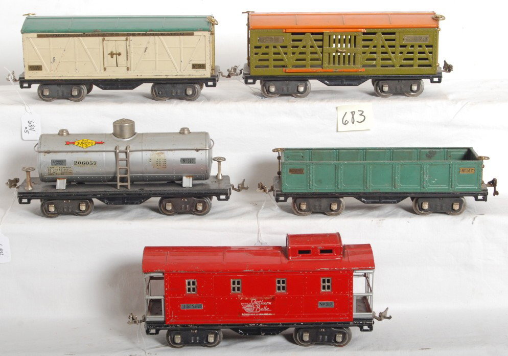 Prewar Lionel standard gauge freight cars: Prewar Lionel standard gauge freight cars with a couple added decals. Trains should clean to look nice C6 area. 512 gondola, 513 stock car, 514 boxcar, 515 Sunoco tank (some decals), and 517 caboose (