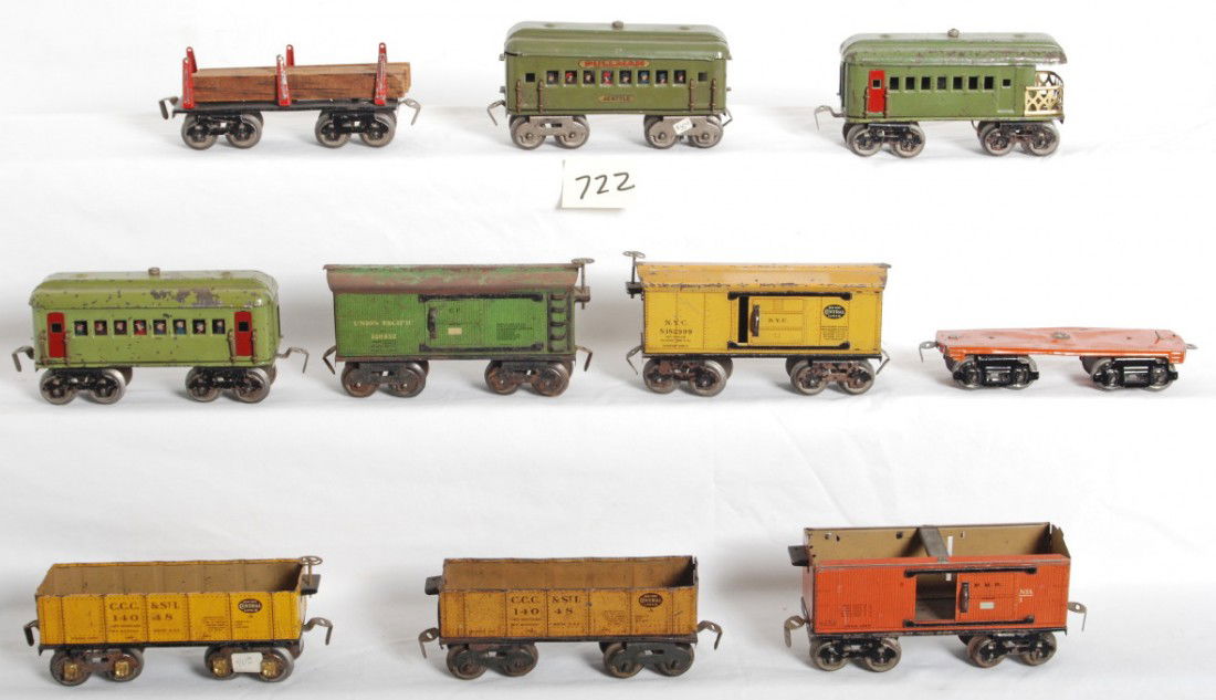 Large lot of Dorfan freight and passenger cars: Large lot of prewar Dorfan O gauge passenger cars and freight cars. One box car is missing the roof and brake wheel. One flatcar is missing stakes or? Trains otherwise look C5-6.