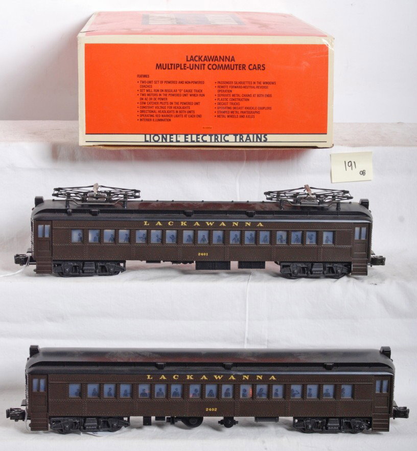 Lionel 18304 Lackawanna commuter set: Lionel modern O Gauge Lackawanna commuter car set in OBs. 18304 is the catalog number. Includes one power and one dummy unit. Cars look C8 with some run time. OB has some rubs, dents and one tear at e