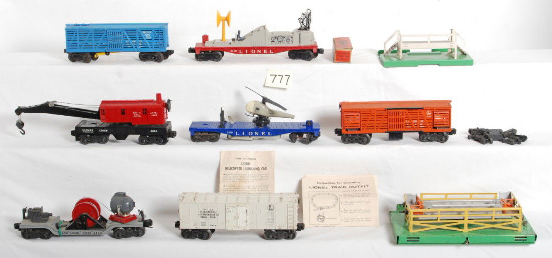 Lionel action cars 3472, 3356, 3386, 3540, etc: Lionel Postwar O Gauge action cars. Includes 3356 operating stock car with cattle in OB, 3472 and 3472P milk car platform, 6560 Erie crane, 3650 searchlight car, 3386 operating giraffe car (no telltal