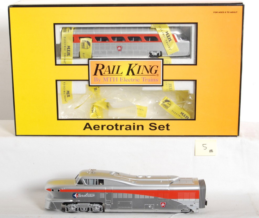 Railking Pennsylvania Aerotrain set with Proto 2.0: MTH Railking modern O Gauge Pennsylvania Aerotrain set in OB. Catalog number is 30-2210-1. Set features Protosound 2.0 with DCS control. Set box has some very light corner and edge wear along with pri