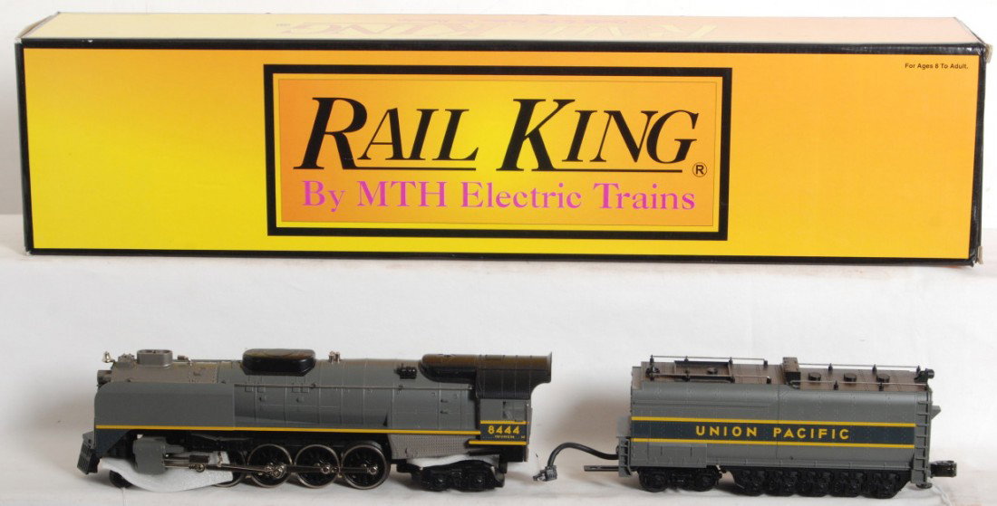 Railking Union Pacific FEF Northern with Proto: MTH Railking Union Pacific FEF Northern in OB. Catalog number is 30-1151-1. Loco features smoke, Protosounds, and more. OB shows light wear. Loco is C8 with some run time.
