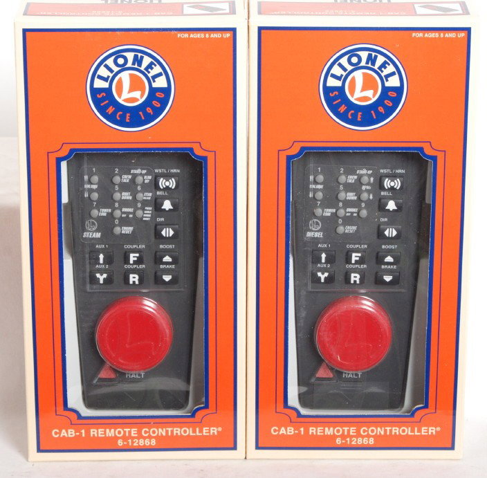 2 Lionel Cab-1 remote controls: Lionel modern O gauge 12868 TMCC Cab-1 remote controls in OBs. Remotes appear to be C8-9 with little if any use.