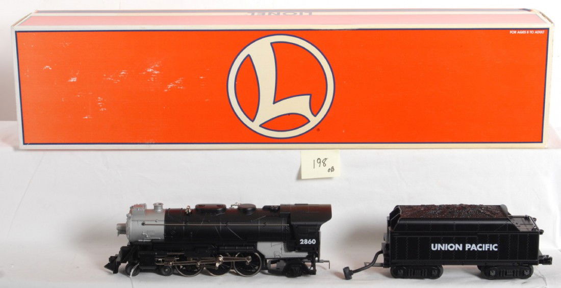 Lionel Union Pacific 4-6-2 with TMCC: Lionel modern O gauge Union Pacific 4-6-2 steam locomotive in OB. Catalog number 28034. Loco features TMCC, Railsounds, Electrocouplers and more. OB has some corner distress.