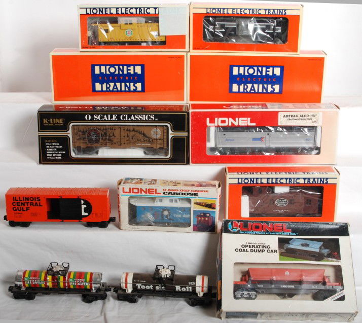 10 Lionel freight, Cabooses, etc.: Ten Lionel modern O gauge cars, loco dummy units and more. Includes 9180 Rock caboose, 17611 NYC caboose, 19726 NYC caboose, 19715 DM&IR caboose, 8667 Amtrak Alco B, 18919 Santa Fe dummy Alco, 18937 A