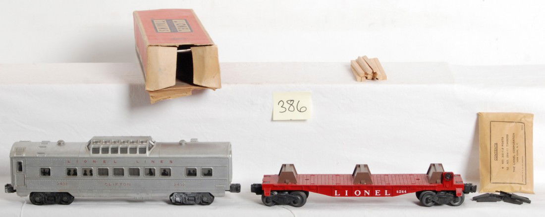 Lionel 2432 Clifton w/OB and 6264 w/components in: Postwar Lionel O gauge No. 2432 Clifton vista dome passenger car in original box missing flaps on both ends. Car looks C5-6. 6264 lumber car with 6264-8 components envelope with timbers and posts, unr