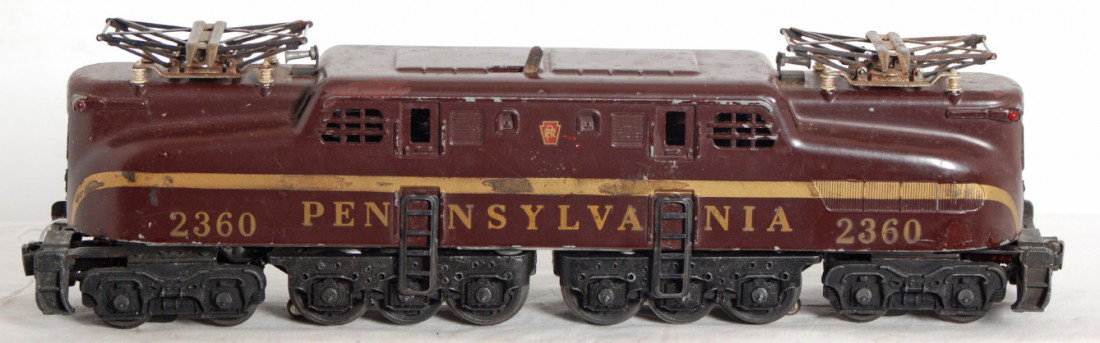 Lionel 2360 Pennsylvania GG-1 electric locomotive: Postwar Lionel O gauge No. 2360 Tuscan Pennsylvania GG-1 electric locomotive with solid stripe. Train looks C6.
