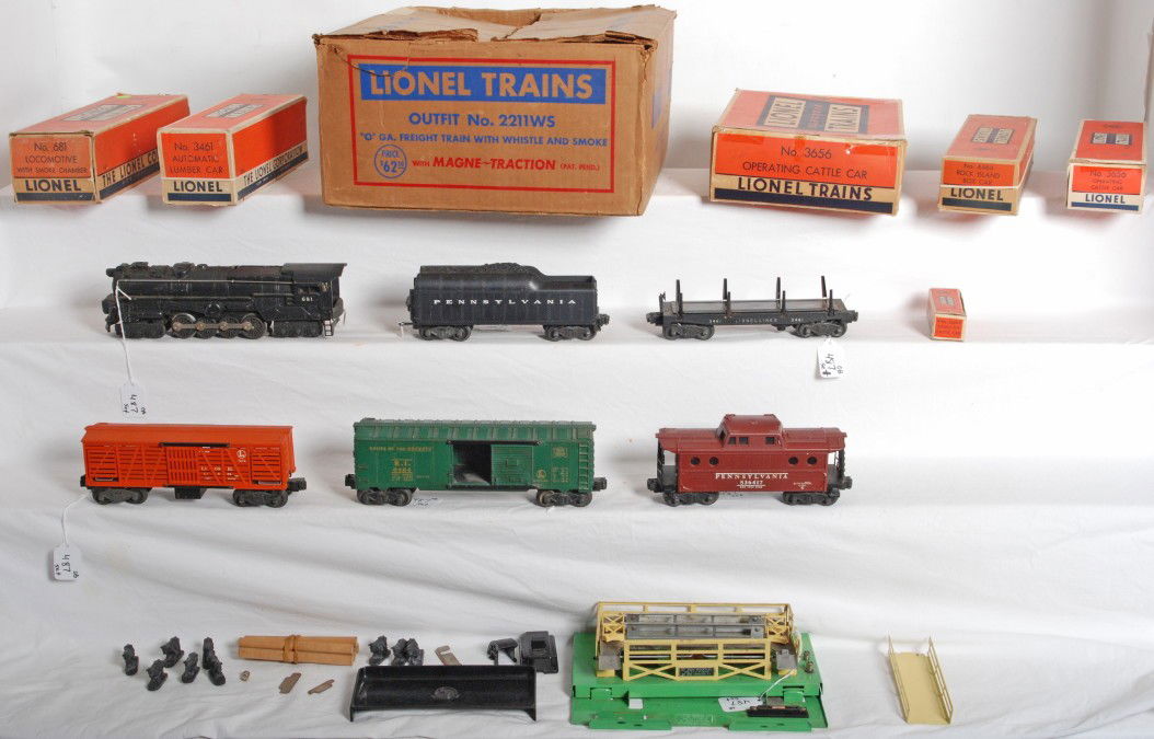 Lionel 2211WS O ga. freight train w/whistle and sm: Postwar Lionel O gauge No. 2211WS freight train with whistle and smoke set in original boxes. Set is composed of 681 locomotive with smoke chamber, 2046W-50 Pennsylvania whistle tender (no box, 3461 a