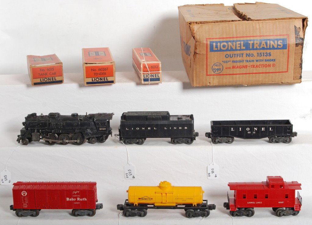 Lionel Outfit No. 1513S freight train with smoke i: Postwar Lionel O gauge Outfit No 1513S 027 freight train with smoke in original set box with some inner boxes. Set is composed of: 2037 steam loco, 6026T tender, 6012 gondola, 6014 Pennsylvania Baby R