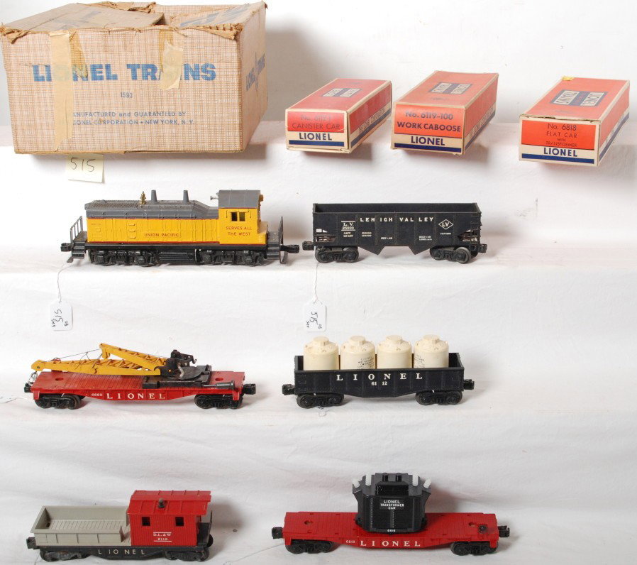 Lionel 1593 U.P. NW-2 diesel freight set in OB: Postwar Lionel O gauge 1593 U.P. NW-2 diesel switcher set in original set box with some inner boxes. Set is comprised of 613 U.P. NW-2 diesel switcher (super tight hairlines at screw), 6660 boom crane