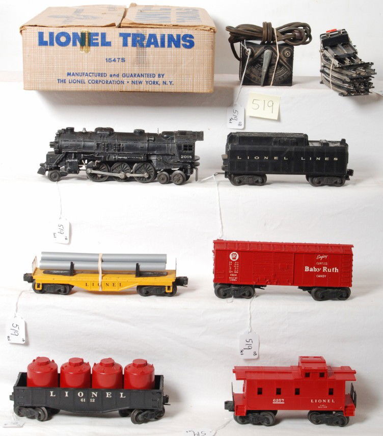 Lionel 1547S steam freight set in original box: Postwar Lionel O gauge 1547S steam freight set in original box consisting of 2018 steam loco, 6026T tender, X6014 Pennsylvania Baby Ruth boxcar, unnumbered pipe car, 6112 gondola with four red caniste