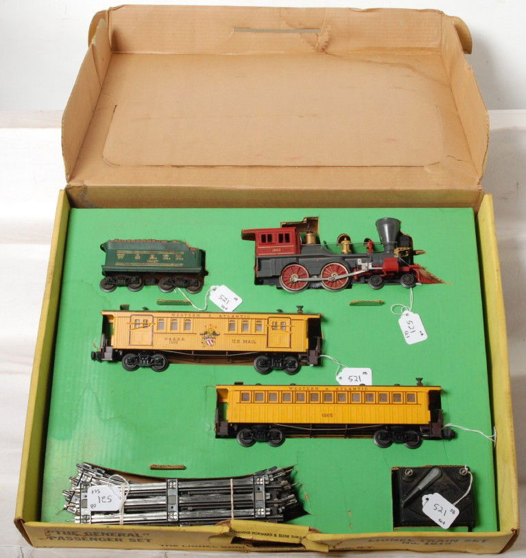 Lionel 1612 The General passenger set in OB: Postwar Lionel O gauge No. 1612 The General Western and Atlantic Railroad No. 1862 steam locomotive and 1862T tender (surface rust on underside of frame) with 1865 passenger coach and 1866 baggage car