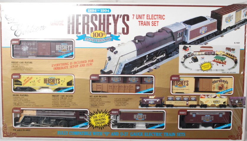 K Line K-1401 Hershey train set sealed: K Line modern O gauge K-1401 Hershey Chocolate train set in OB. Set is still sealed in factory plastic and assumed C10. Plastic does have a few rips, but is still pretty complete.