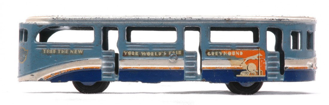 Arcade 1939 NY WorldÕs Fair Greyhound Bus: Arcade cast iron 1939 New York WorldÕs Fair Greyhound Lines bus, The bus measures 8 1/4 inches in length. The bus is C6.