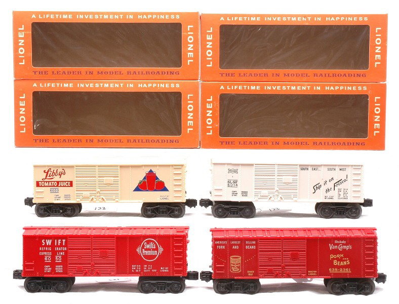 Lionel Boxcars 6014-325 638-2361 6050 6050-110: Lionel postwar boxcars with coin slots including; 6014-325 white Frisco boxcar, 638-2361 Van CampÕs boxcar, 6050 LibbyÕs Tomato Juice boxcar and a 6050-110 red Swift boxcar all in reproduction boxes