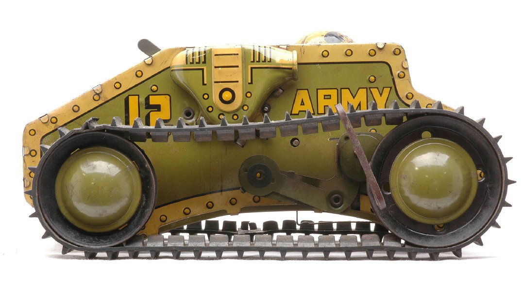 Marx Wind Up Tin Litho Army Tank 12: Marx wind up tin lithographed Army tank, circa early 1940. The tank measures 9 1/2 inches in length and is lettered Army 12, C6.