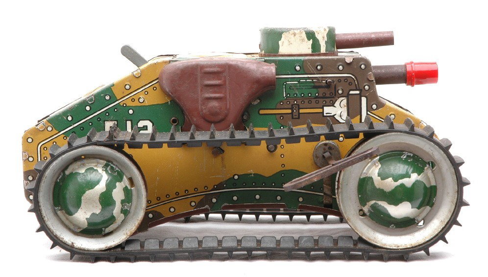 Marx Wind Up Tin Litho Army Tank E12: Marx wind up tin lithographed Army tank, circa early 1940. The tank has a camouflage design, measures 9 1/2 inches in length and is lettered E12, C6.