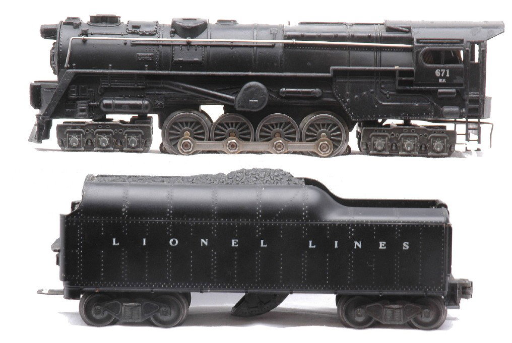 Lionel 671RR Steam Turbine Loco 2046W-50 Tender: Lionel postwar 671RR black 6-8-6 steam turbine loco and a 2046W-50 tender. The loco has some touch ups and is C7. The tender has a chip in the front, step is cracked and the water scoop has been paint