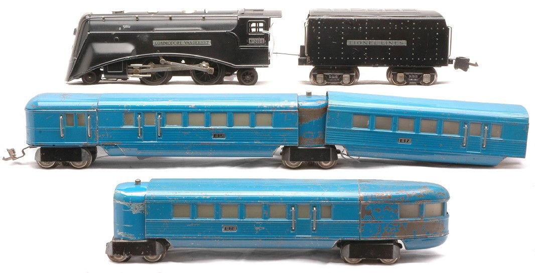 Desirable Lionel China Blue Streamliner Set 6510E: Desirable Lionel prewar O gauge China blue streamliner set no. 6510E containing; 265E black Commodore Vanderbilt 2-4-2 steam loco, 265T tender, 619 baggage-coach, 617 coach, 616 observation and two ve