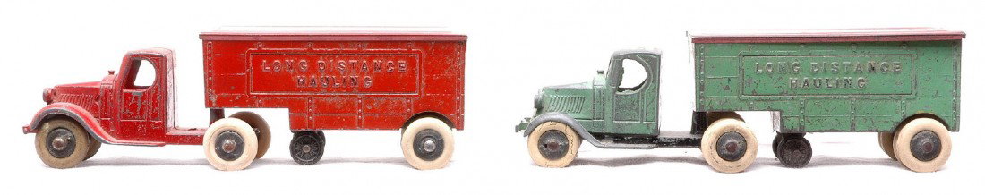TootsieToy two 0803 Mack Long Distance Hauling: TootsieToy two 0803 Mack Long Distance Hauling semi trailer trucks, one all red and the other one red and green. Both trucks are C6.
