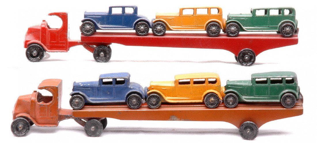 TootsieToy two 190 Mack Auto Transports w/Cars: TootsieToy two 190 Mack auto transports each with three cars one transport is red and one is orange. The auto transports are C6-7.