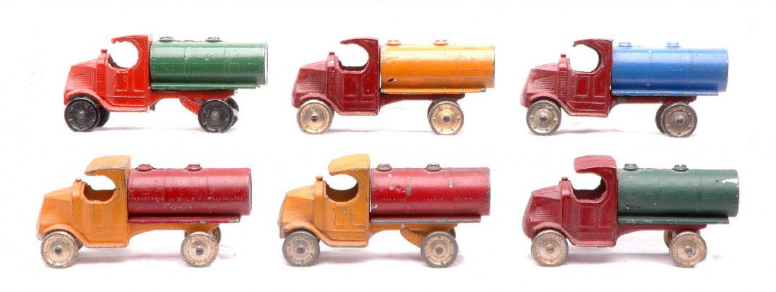 TootsieToy six Mack Oil Tank Cars: TootsieToy six 4640 Mack oil tank cars in that each measure 3 1/4 inches in length in various color combinations. The tanks are C6.