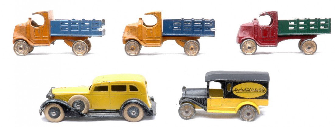 TootsieToy Hoschschild, Kohn & Co 3-4638 0613: TootsieToy Hochschild, Kohn & Co. delivery van that measures 3 inches in length and three 4638 Mack stake trucks in various color combination that each measure 3 1/4 inches in length. Also included is